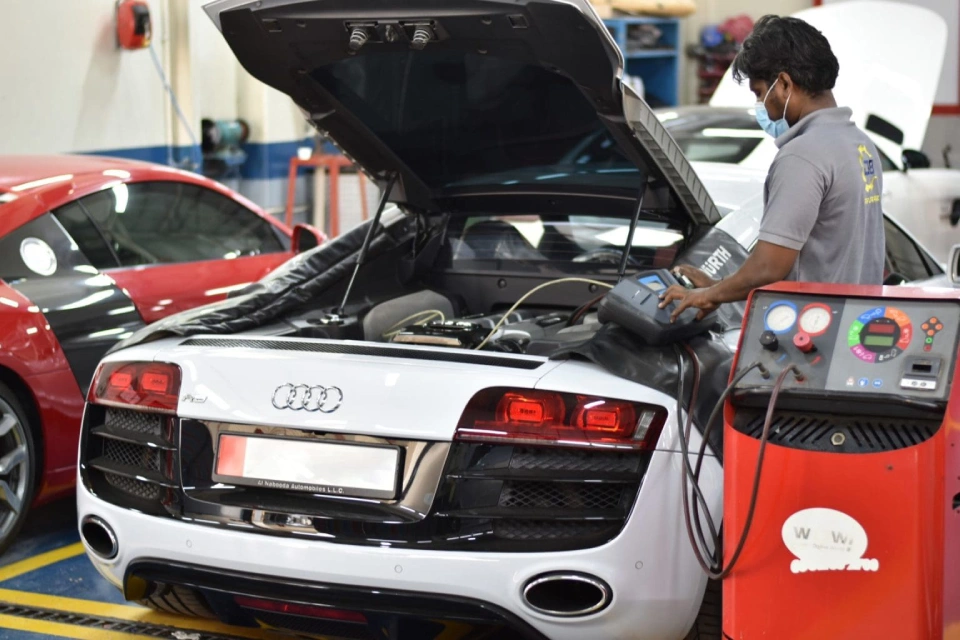 an Audi model being checked in Audi service center Dubai, UAE