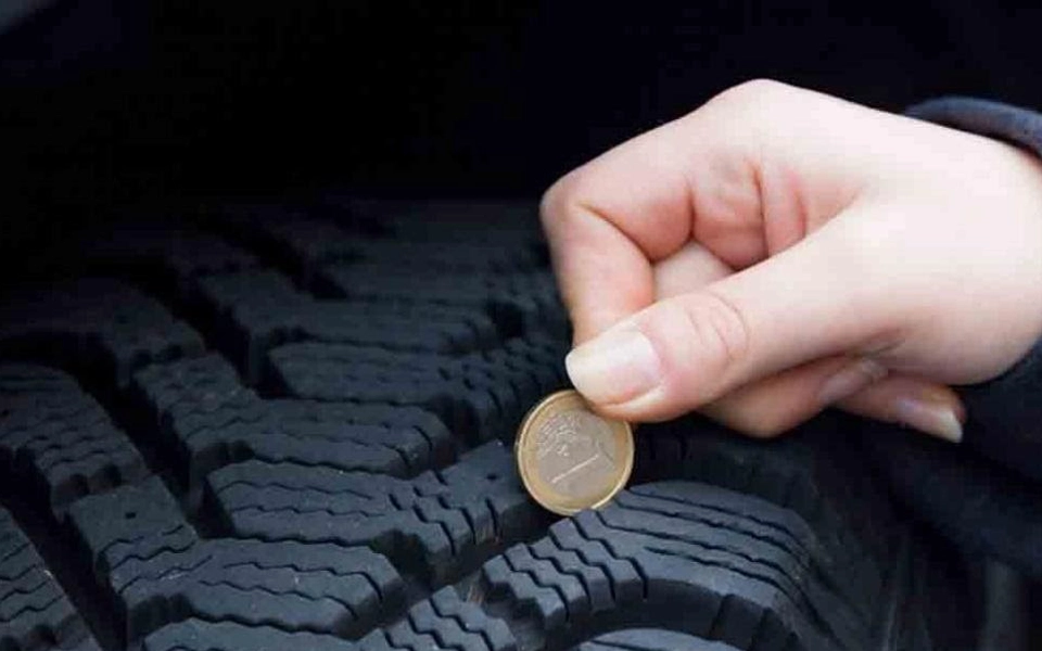 tyre tread depth and wear pattern check on used car