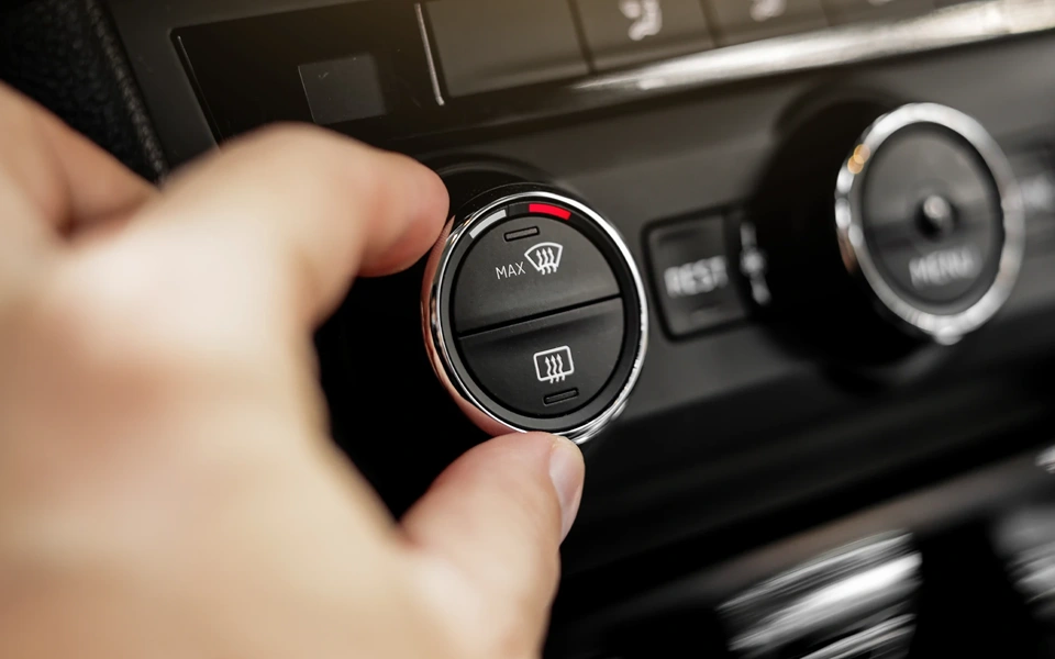testing AC cooling and infotainment responsiveness in used car
