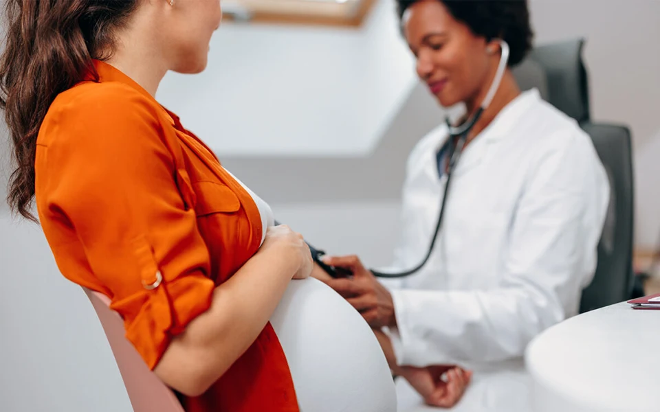 The image shows the core coverage and specific needs to consider when buying health insurance for women in the UAE.